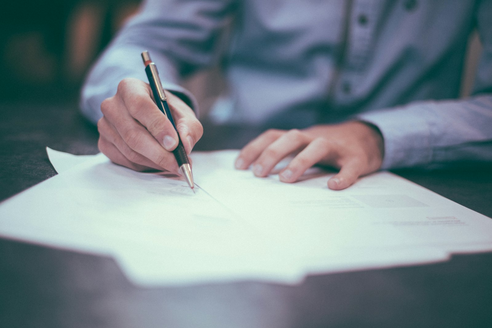 Signed legal documents on a desk